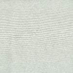 Refined lounge chair in Warwick’s Fireguard deep sage fabric
