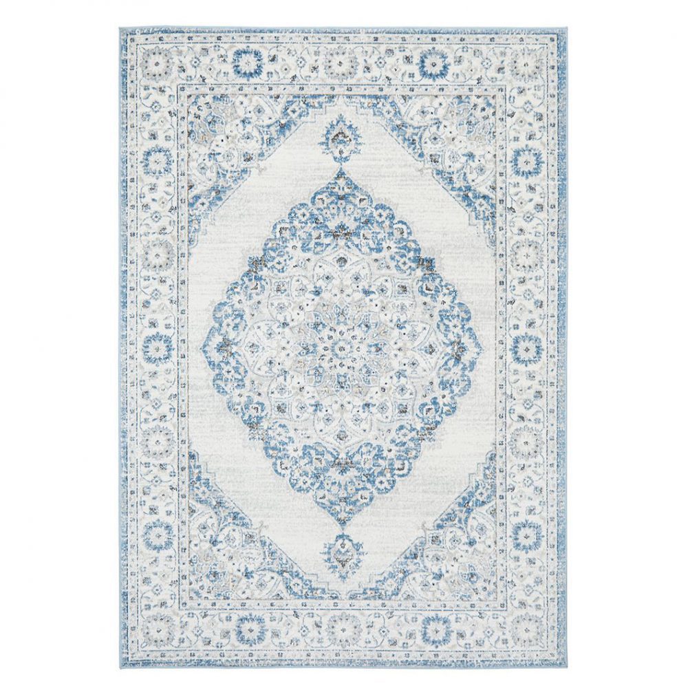 Living in Style Persian-style rug in a chic, contemporary home office